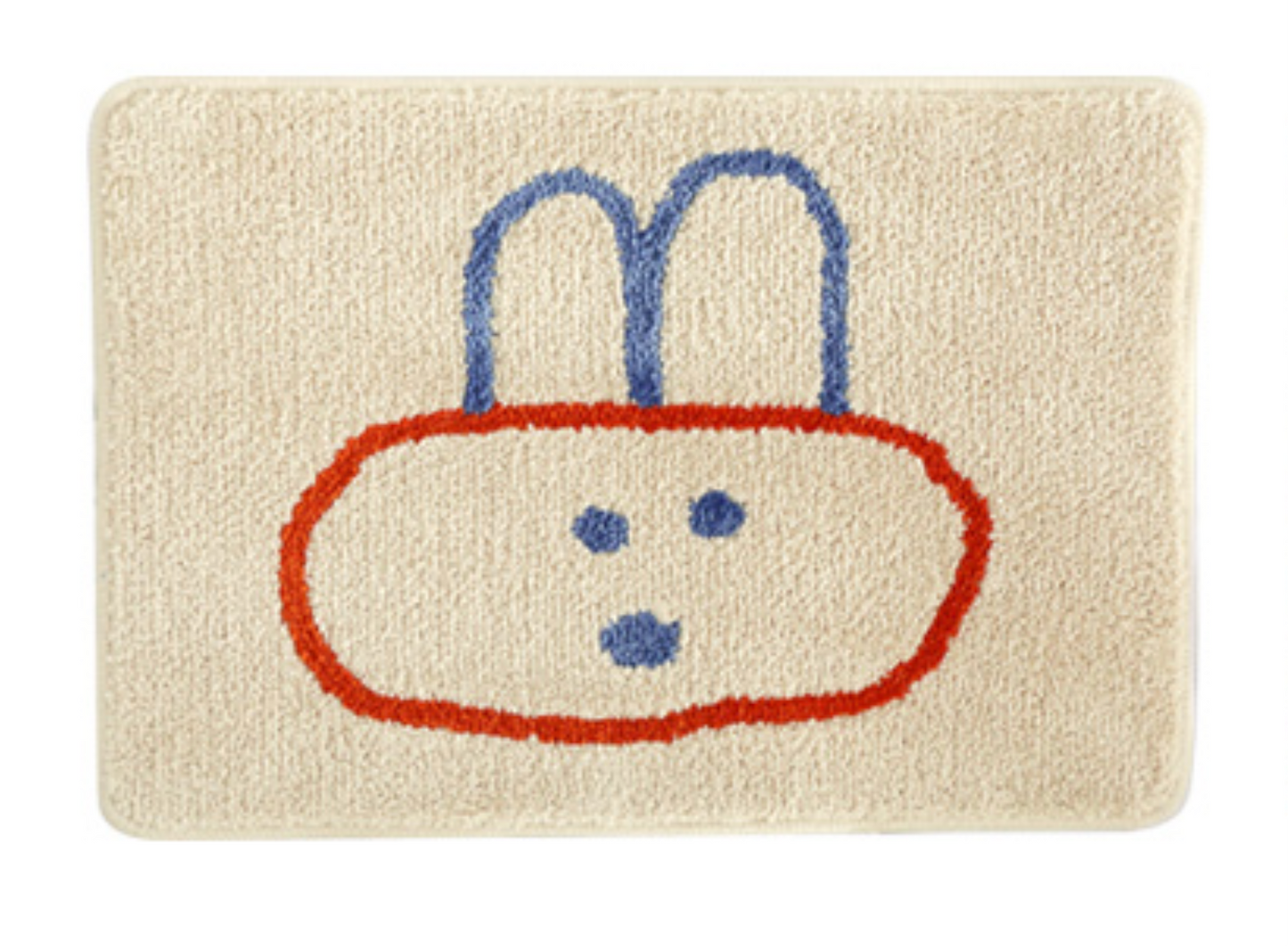Beige bath mat with a cartoon bunny design on a white background