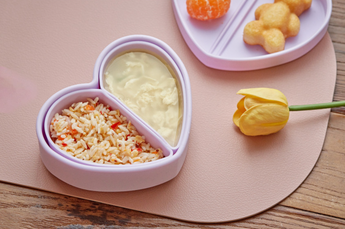 Heart lunchbox filled with fruit and rice – cute meal for kids
