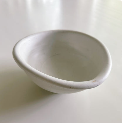 White ceramic bowl on a white background